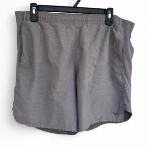 Nike Women’s Grey Athletic Shorts with lining insert and pockets size M thumbnail 1