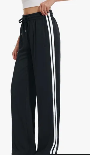 Black with white strip joggers Size M thumbnail 1
