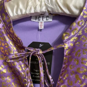 TCEC Metallic Purple Animal Print Puff Sleeve Babydoll Dress Western Boho Glam thumbnail 5