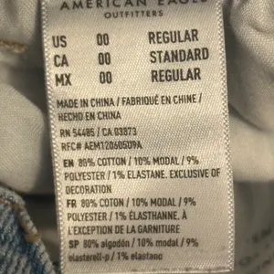 American Eagle Stretch Distressed Mom Jeans thumbnail 6