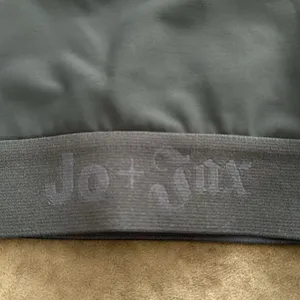 Jo + Jax sports bra. Elastic bottom with logo. Color- gray/hot pink. Size-XSA thumbnail 2