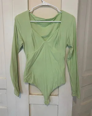 Women’s long sleeved thong body suit thumbnail 1