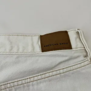 American Eagle Distressed Boyfriend Shorts in White thumbnail 3