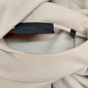 Fear of God Essential Logo-print Hoodie in Neutral size Large thumbnail 8