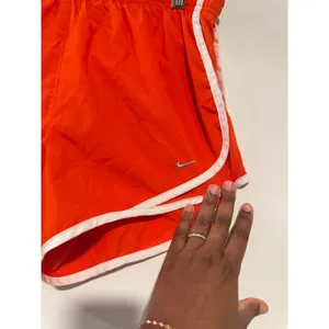 Nike Dri-FIT Tempo Running Shorts Women’s‎ Small Orange White Trim Athletic thumbnail 2
