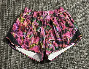 Lululemon Hotty Hot Low Rise Short 4" Hyper Flow Pink Multi Black Size 4 thumbnail 1