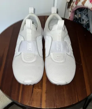 Nike Women’s Slip-On Sneakers thumbnail 1