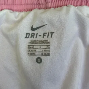Nike Women's Pink and White Athletic Running Shorts Size Small thumbnail 7