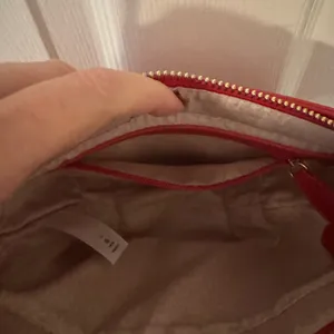 Elegant Red Shoulder Bag with Gold Accent thumbnail 3