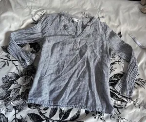 “The Tunic Shirt” from Old Navy in a soft, cool-toned gray thumbnail 1