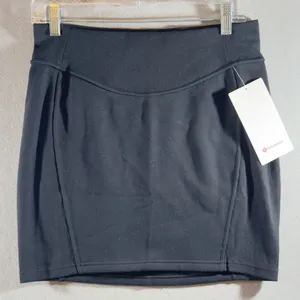 489 | NWT Lululemon Scuba High Rise Mini Skirt Black Soft Fleece‎ M thumbnail 1