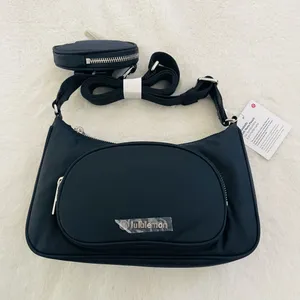 Lululemon Black Crossbody Bag with Nano pouch thumbnail 1