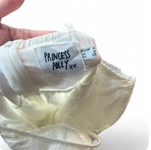 Princess Polly white mini dress with lace detailing and button-up front, size 4 #princesspolly #mini thumbnail 3