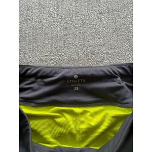 Athleta Womens Gray Pleated Back Athletic Skort Neon Yellow Shorts XS‎ thumbnail 4