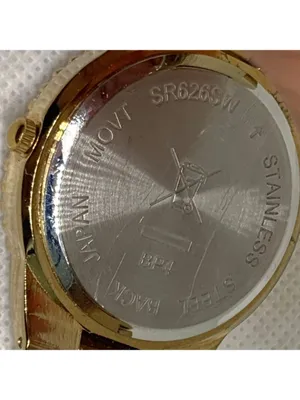 Women’s gold tone watch 38mm round quartz analog mop dial size 7” running thumbnail 7