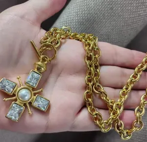 Chunky gold cross necklace with pearl and toggle clasp thumbnail 4