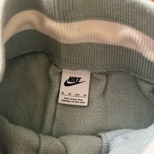 Nike Women’s Mint Green High Waisted Drawstring Embroidery Shorts thumbnail 5
