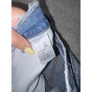 American Eagle Women's Size 12 Long Ripped Distressed Light Wash Comfort Stretch thumbnail 6