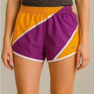 Nike Dri-Fit Size Medium Orange and Purple Running Athletic Shorts thumbnail 1