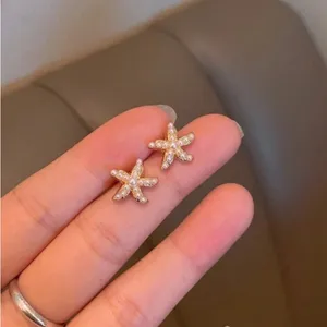 Gold Starfish Pearl Earrings thumbnail 7