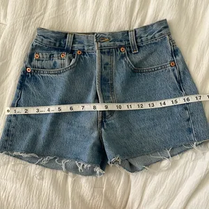 Levi's Blue Jean Shorts with Frayed Hem and Distressed Look Vintage thumbnail 6