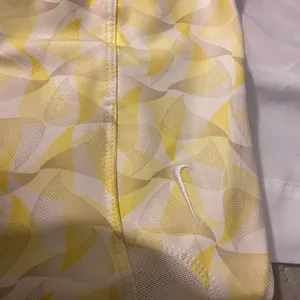 Nike Golf skort yellow and grey designer golf women's size 4 with a 16” waist thumbnail 8