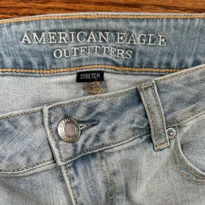 American Eagle Outfitters Distressed Blue shortie Jean Shorts. Waist 32 in thumbnail 2