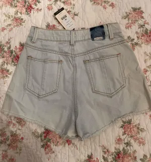 NWT denim shorts distressed rip curl thumbnail 2