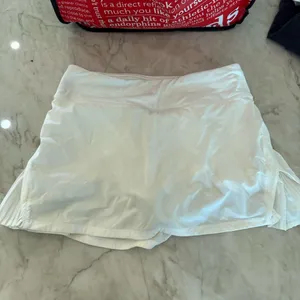 Lululemon EUC: Play off the Pleats Mid-Rise Skirt thumbnail 1
