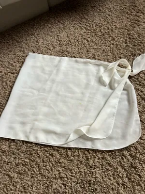 Dottie Couture white mini coverup skirt with tie detail #skirt #feminine thumbnail 2