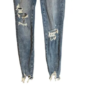 American Eagle Women’s Blue Distressed Shark Bite Fringe Denim Jeans Size 0R thumbnail 4