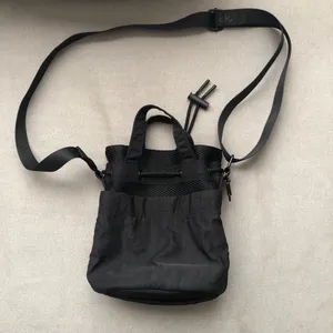 Alo Yoga Cross Body Bucket Bag Black thumbnail 9