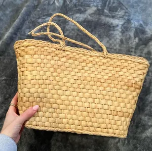 Revolve Woven Tan Handbag thumbnail 1