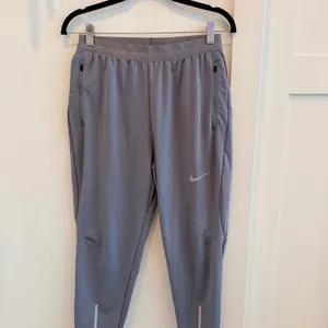 Nike Dri Fit Women's Gray Running Joggers Elastic Waist Draw Strings Size Medium thumbnail 2