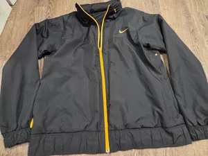Nike Livestrong Women’s XL Windbreaker Jacket Reversible Black Yellow Hooded Zip thumbnail 1