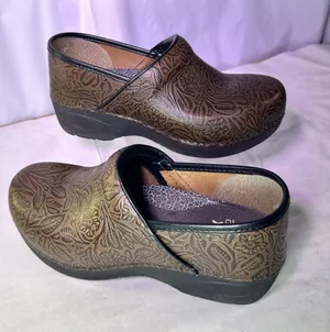 Dansko Brown Floral-Embossed Leather Clogs thumbnail 1