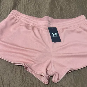 Under Armour Women's Athletic Shorts in Light Pink thumbnail 1