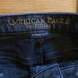American Eagle Extreme Flex jeans-blk frayed bottoms. Straight leg. Distressed thumbnail 3