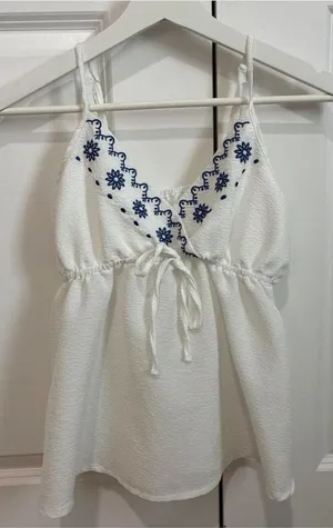 White tank top with blue floral embroidery #floral #embroidered #tanktop thumbnail 1