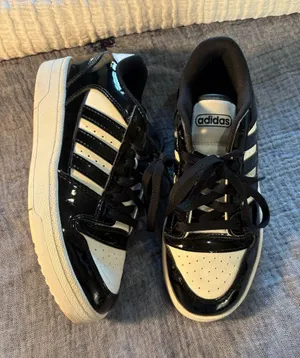 adidas Kids Black and White Low-Top Sneakers with Three Stripes thumbnail 1