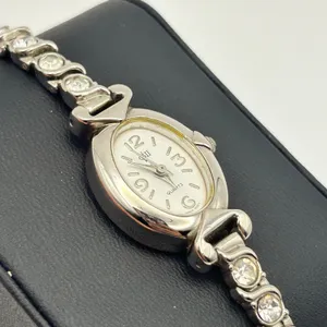 Women’s Silver-tone Watch Oval Dial with Crystals on the Band Working thumbnail 3