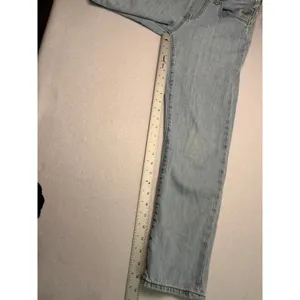 Levi’s classic slim fit light wash overalls. women’s size small. thumbnail 7