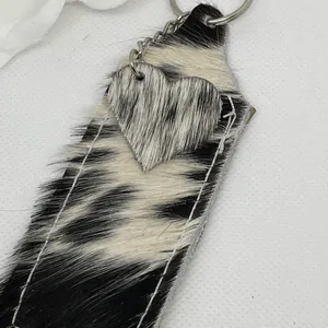 Cowhide chapstick holder. Attach to purse or backpack to keep it handy! thumbnail 4