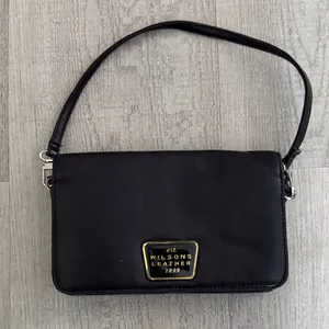 Wilsons Leather Black Mini Bag with Gold Plaque thumbnail 1