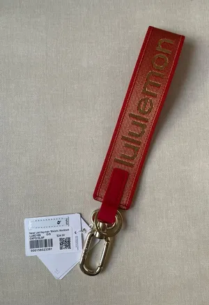 Lululemon Lunar New Year Never Lost Keychain *Metallic Wordmark thumbnail 1