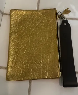 Attilio Giusti Leombruni Gold Leather Wristlet Clutch with Black Strap thumbnail 1