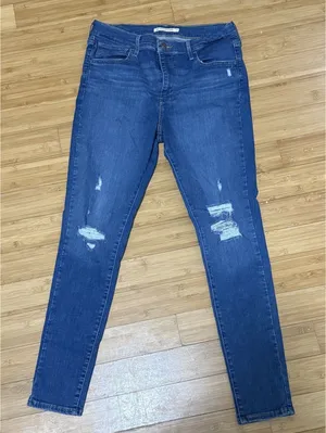 Levi’s 720 high rise skinny jeans women’s size 31 blue distressed denim thumbnail 1