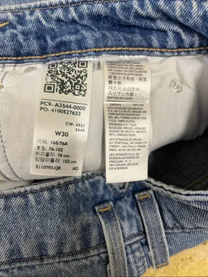 Levi's "High Waisted Mom Shorts" size 30 in medium wash denim. thumbnail 4