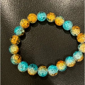 Beaded bracelet in green and yellow. thumbnail 2