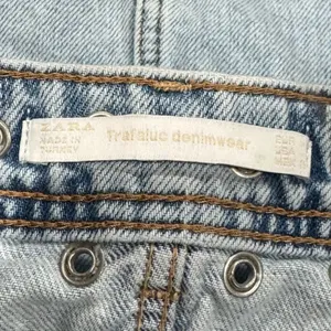 Zara Trafaluc Grommet Distressed Raw Hem Mini Skirt Women’s Medium thumbnail 3